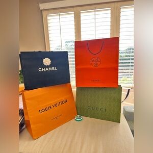 Set of 4 authentic large paper shopping gift bags from multiple luxury boutiques
